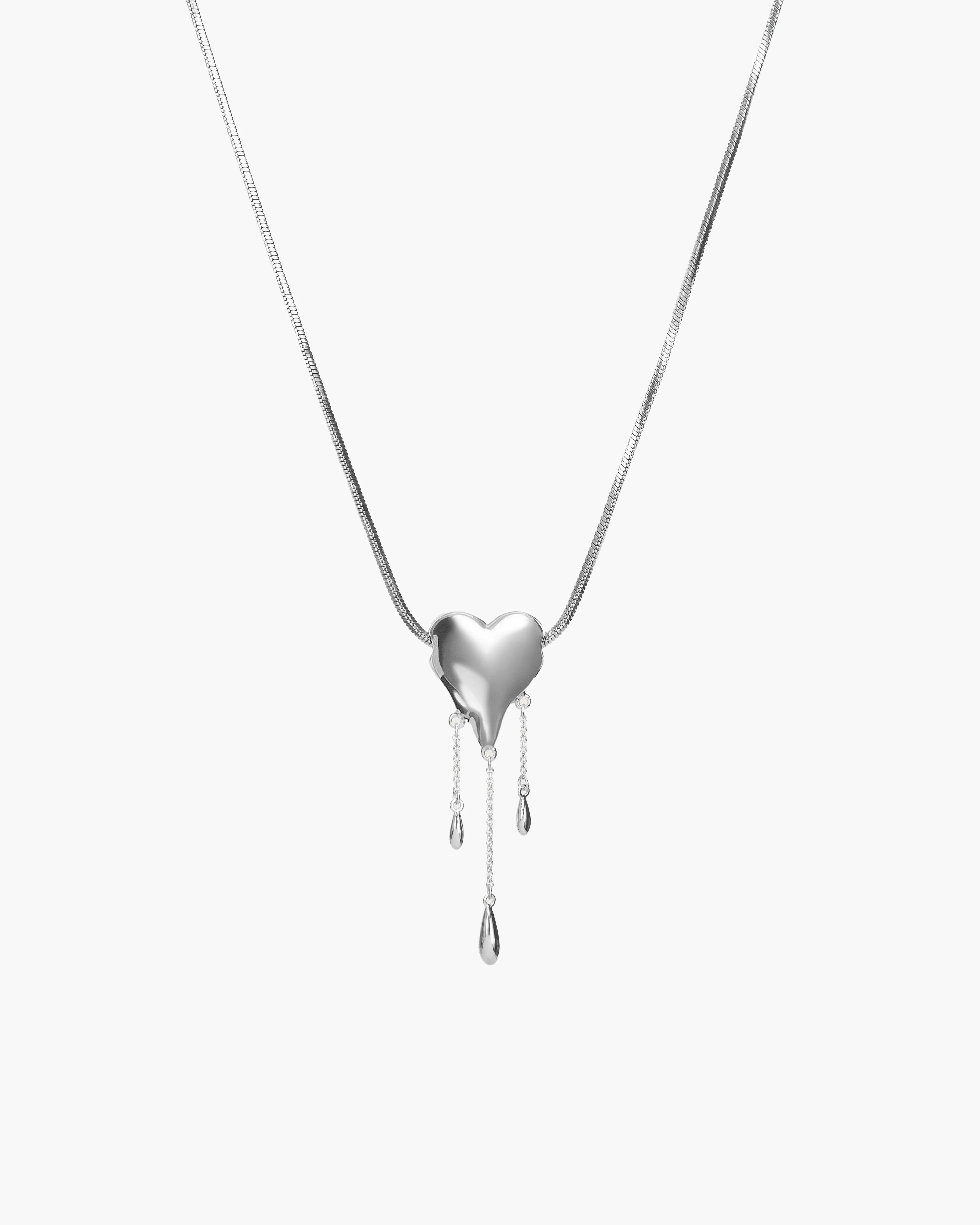 Venom’s Golden Drip Heart Necklace - Image 5